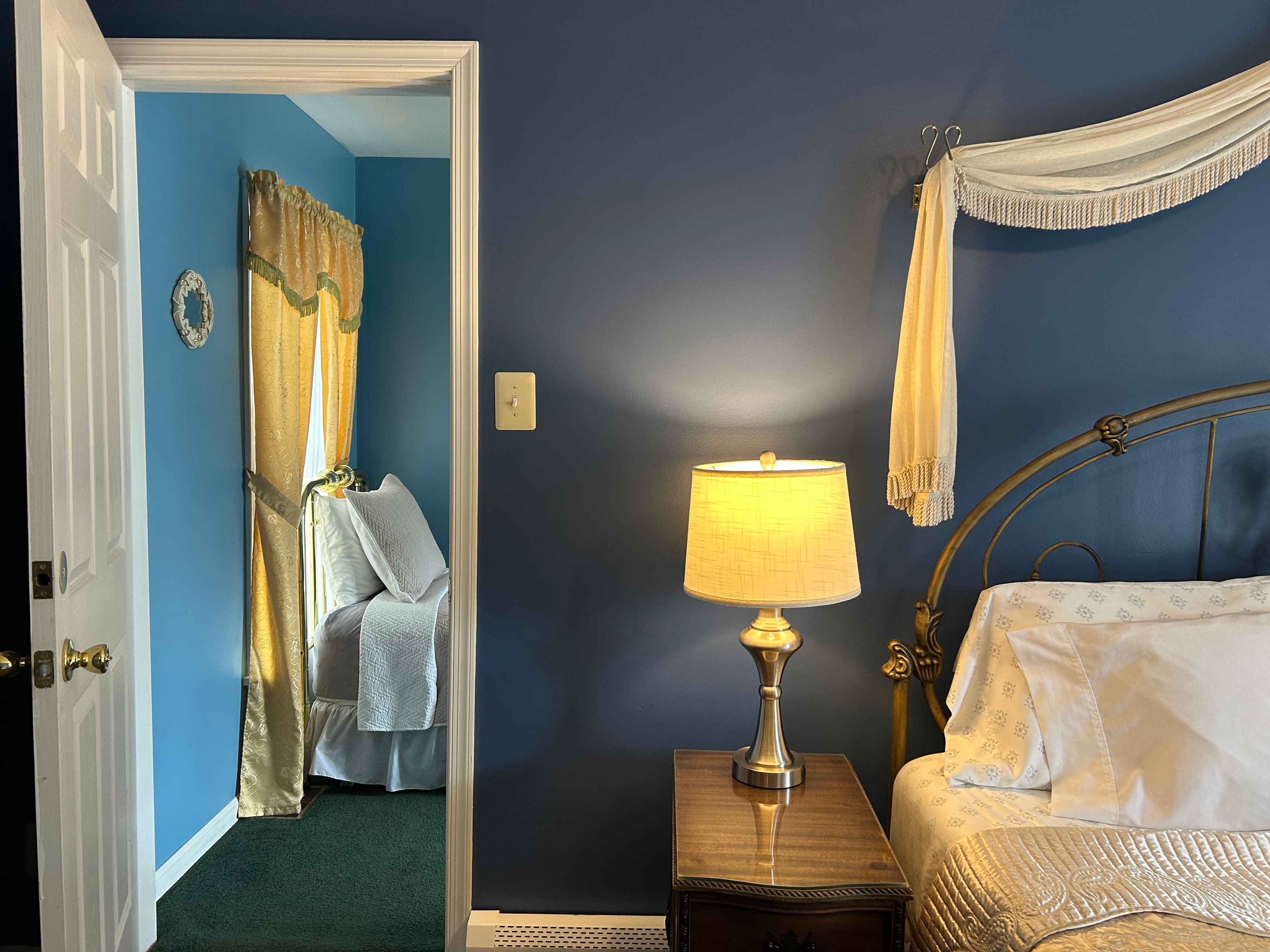 View into twin adjunct room from main room