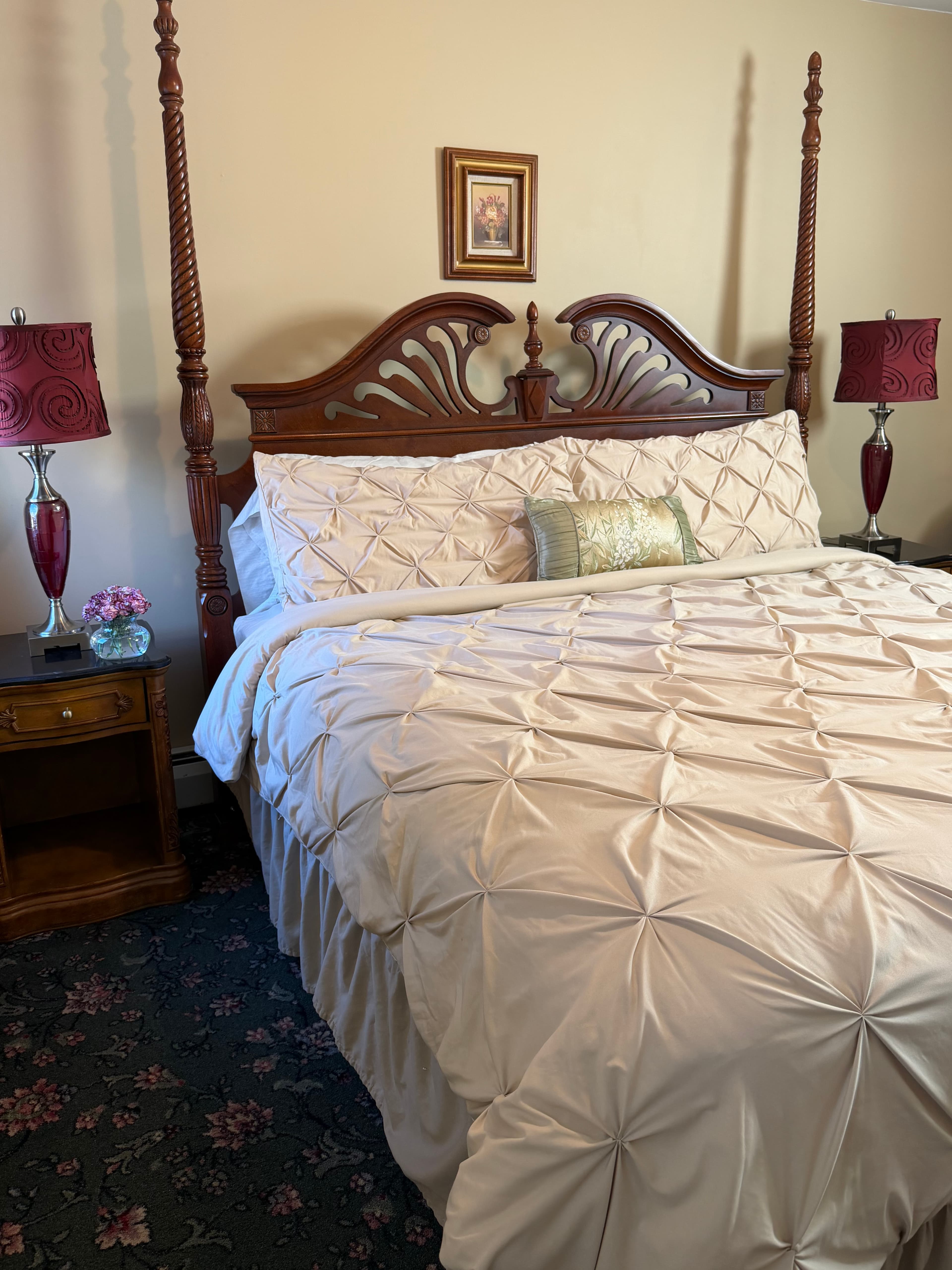 Side view of king bed & end table