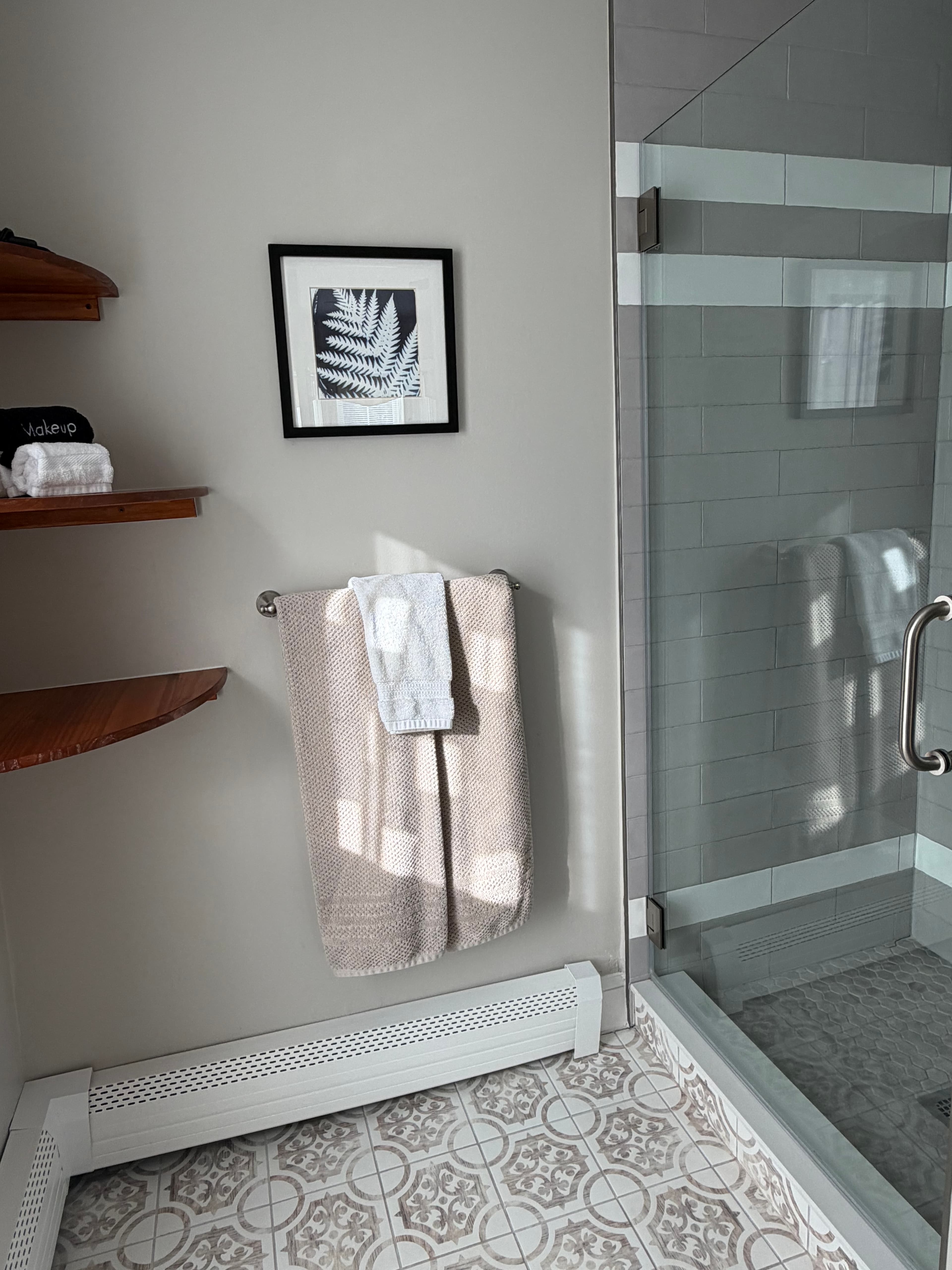 View of bathroom with a glass door shower