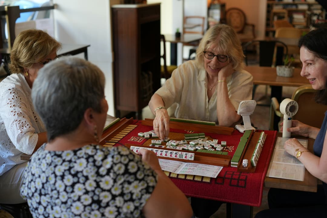 Retreaters playing mahjong in the parlor