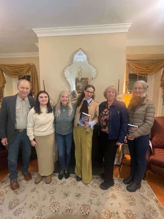 Retreaters with an author in the parlor